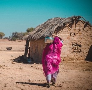 woman-carrying-water