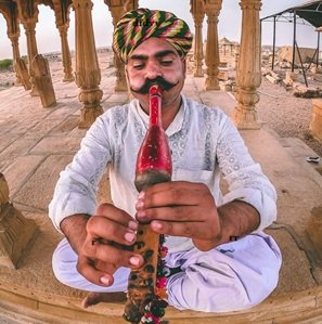 Man-playing-instrument