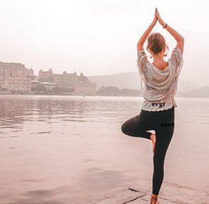 woman-yoga-at-lake