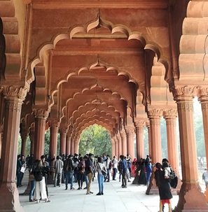 Tourists-walking-under-archs