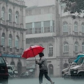 man-with-red-umbrella