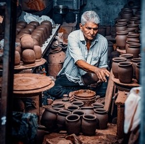 Man-making-pottery