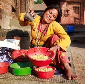 Lady-smiling-food-selling